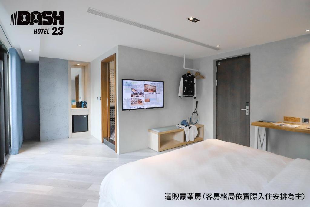 Postel nebo postele na pokoji v ubytování Dash 23 Hotel