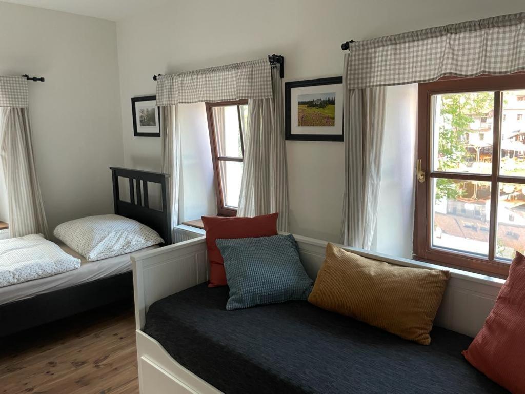 Postelja oz. postelje v sobi nastanitve Apartmány Rožmberk
