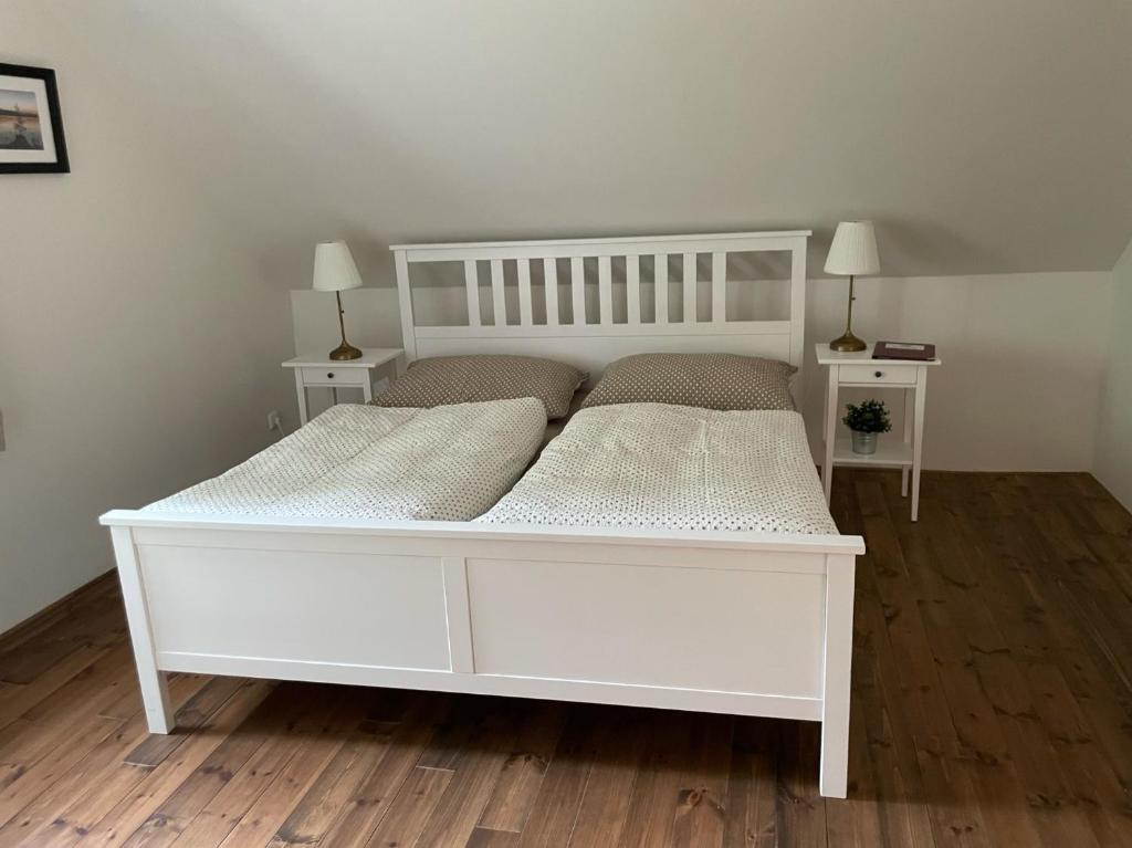 Postelja oz. postelje v sobi nastanitve Apartmány Rožmberk