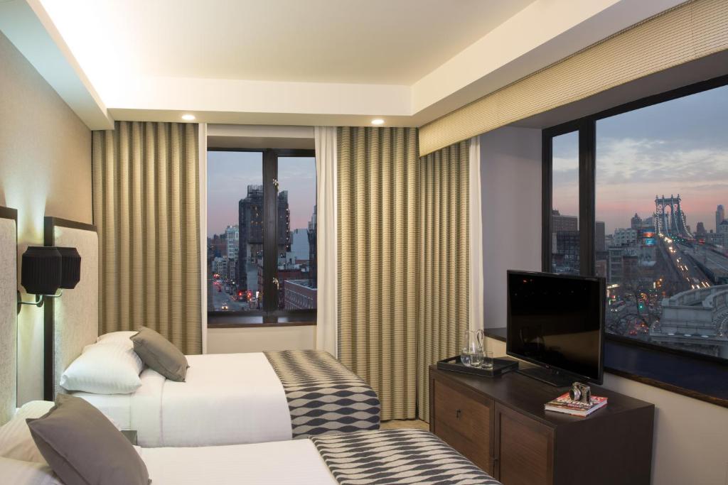 TV a/nebo společenská místnost v ubytování Leon Hotel LES