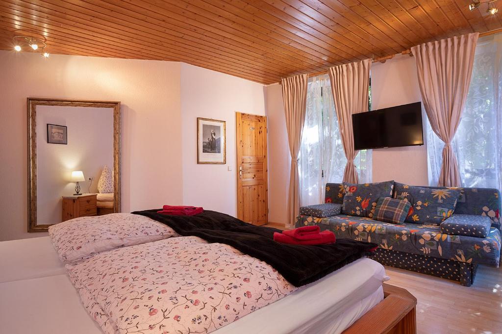 Postel nebo postele na pokoji v ubytování Hotel & Restaurant Sichelschmiede