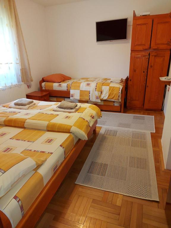 Postel nebo postele na pokoji v ubytování Marko'S Apartments