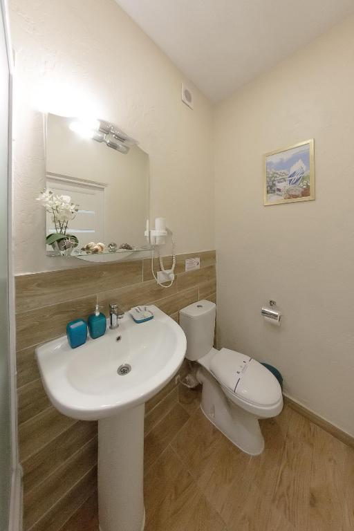 Koupelna v ubytování Apart-Hotel Poseidon