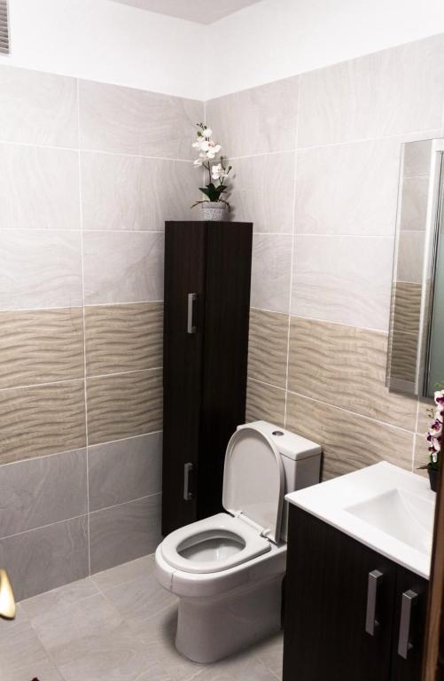 A bathroom at Beachfront & Sunny Apartment Los Gigantes