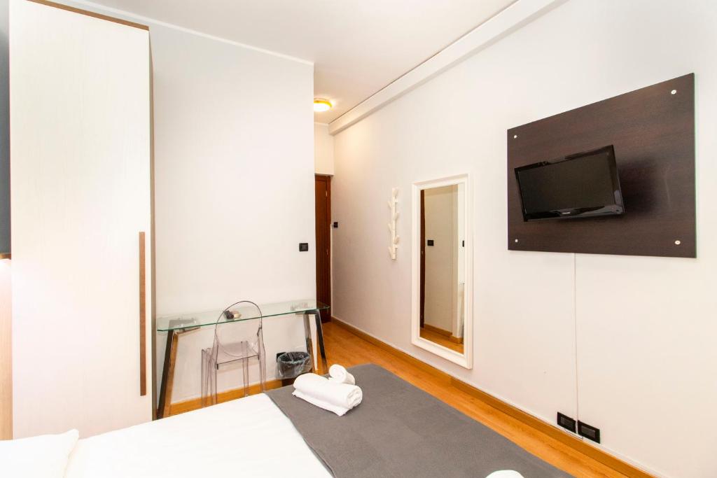 TV a/nebo společenská místnost v ubytování Hotel Cristallo Torino