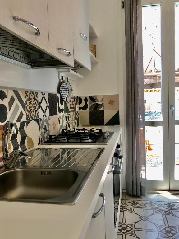 Kuchyňa alebo kuchynka v ubytovaní Casa Colore Loft