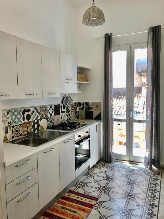 Kuchyňa alebo kuchynka v ubytovaní Casa Colore Loft