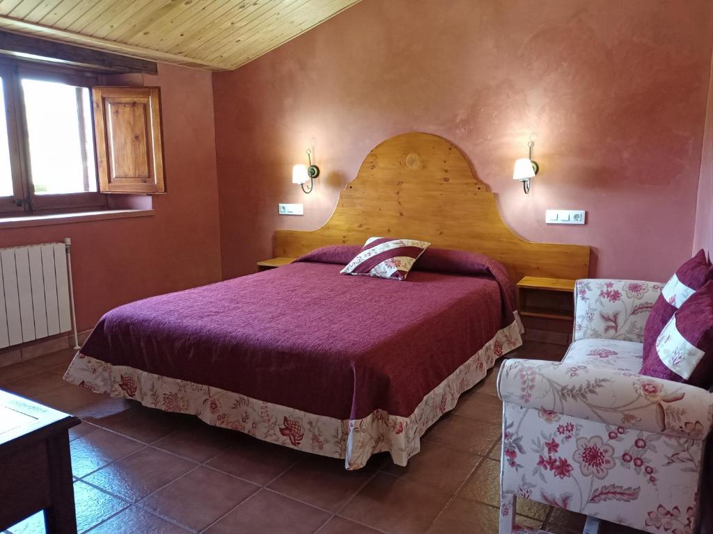 Postel nebo postele na pokoji v ubytování Masia Rovira