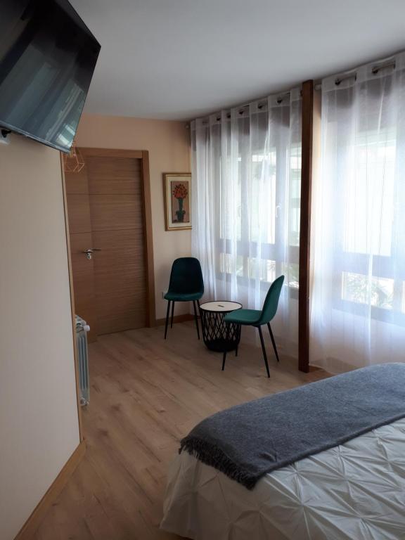 Postel nebo postele na pokoji v ubytování Alojamientos el Paramo