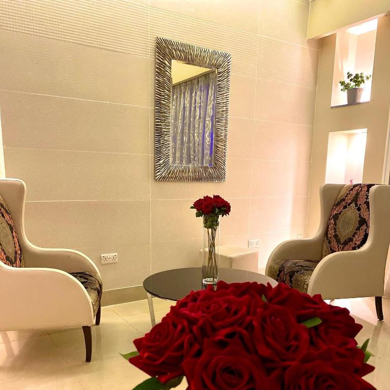 Home Suites Boutique Hotel Freetownにあるシーティングエリア