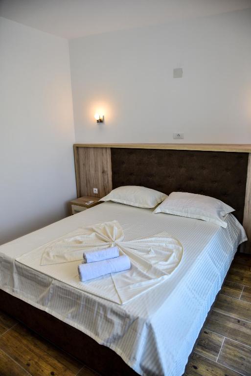 Postel nebo postele na pokoji v ubytování Casa Sinani