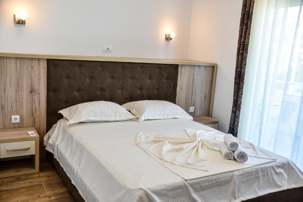 Postel nebo postele na pokoji v ubytování Casa Sinani