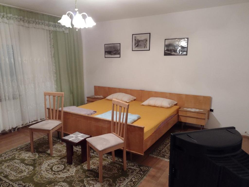 Postel nebo postele na pokoji v ubytování Ćane Rooms