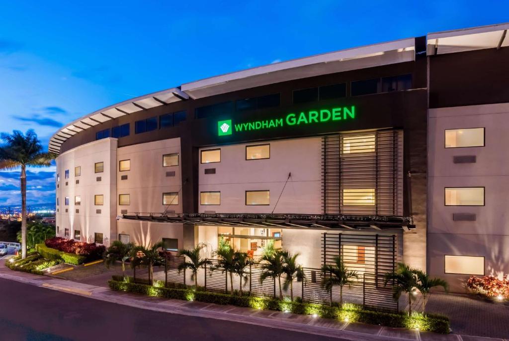 a rendering of the front of the wynyard garden hotel at Wyndham Garden San Jose Escazu, Costa Rica in San José