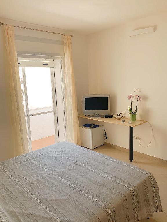 TV a/nebo společenská místnost v ubytování Acquazzura Salento Torre Mozza