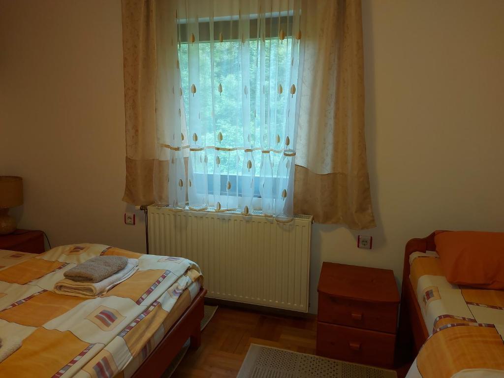 Postel nebo postele na pokoji v ubytování Marko'S Apartments