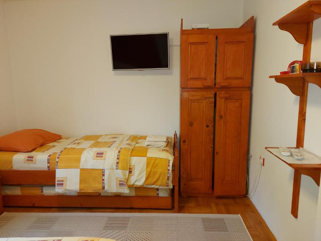 Postel nebo postele na pokoji v ubytování Marko'S Apartments
