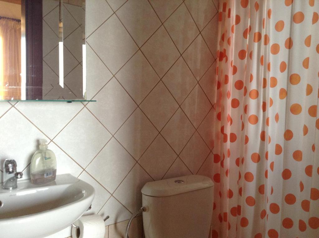 Koupelna v ubytování Guesthouse Lamprini