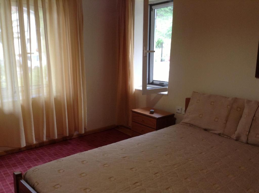 Postel nebo postele na pokoji v ubytování Guesthouse Lamprini