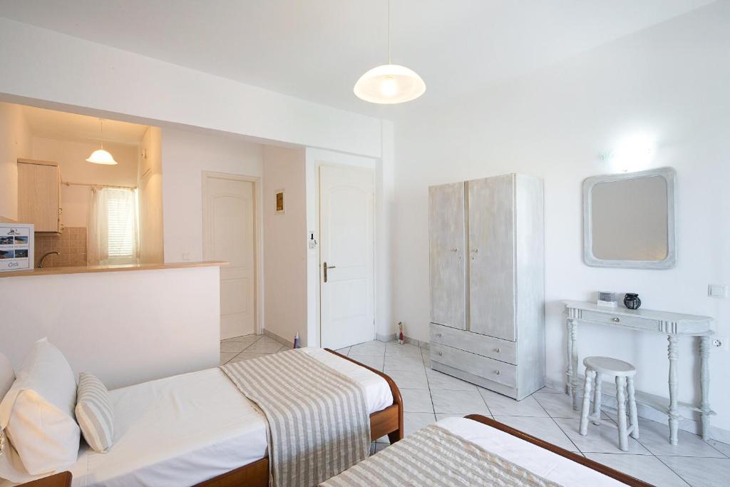 Postel nebo postele na pokoji v ubytování Irini Apartments and Studios