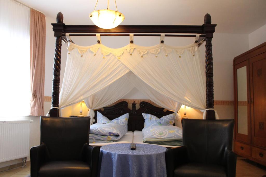 Posezení v ubytování Kreuzerhof Hotel Garni