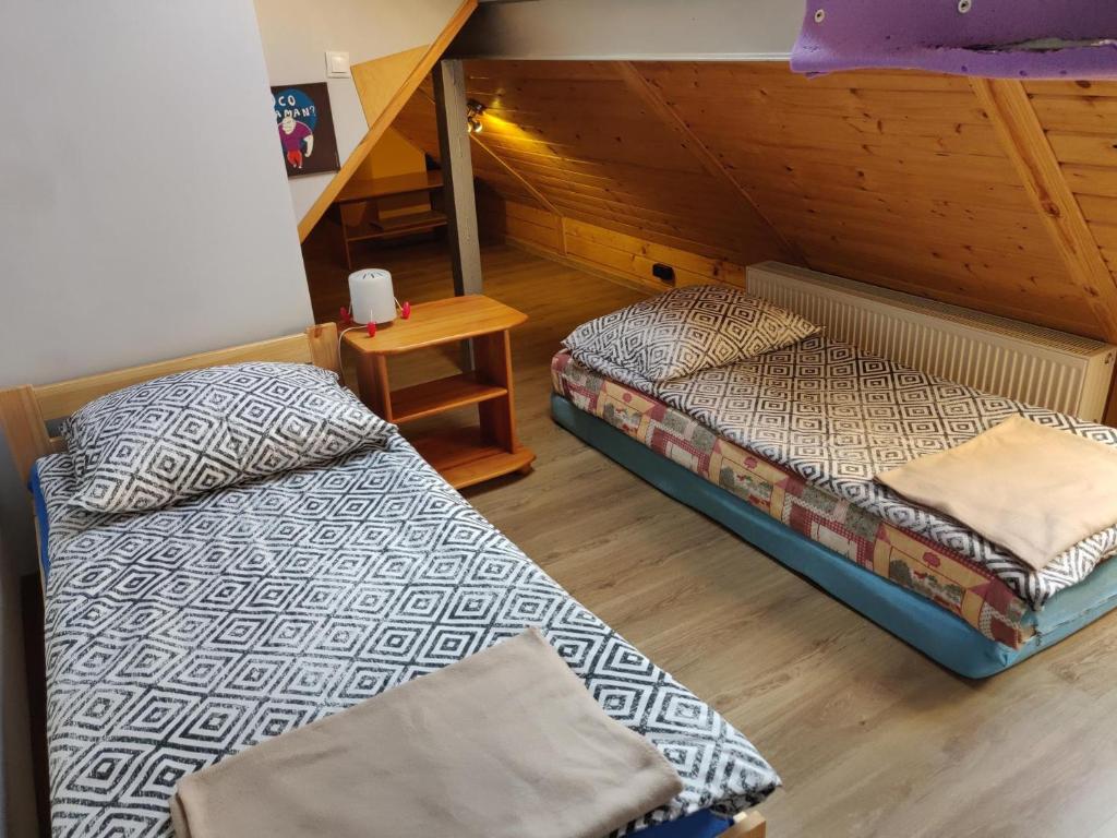 Posteľ alebo postele v izbe v ubytovaní Mieszkanie / Apartament centrum blisko szlaków i wyciągów !!!