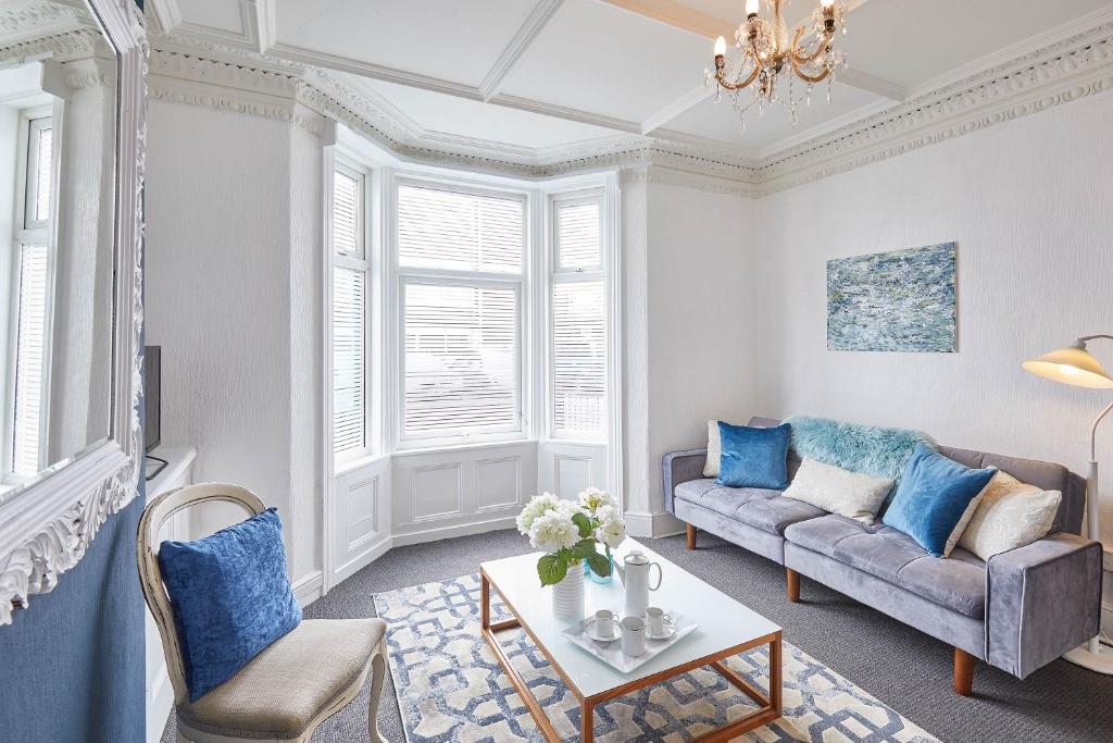 a living room with a couch and a table at Host & Stay - The Gallery Apartments in Scarborough