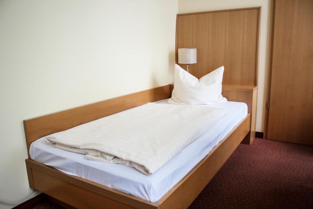 Voodi või voodid majutusasutuse Hotel Erbenhof toas
