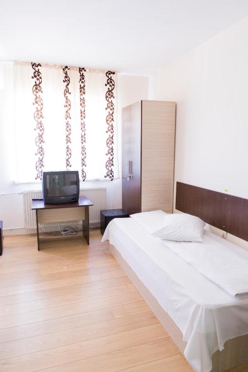 Postel nebo postele na pokoji v ubytování Hostel Holland Bacau