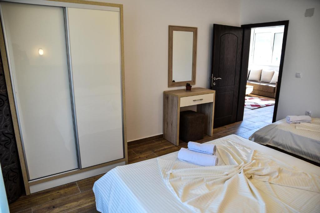 Postel nebo postele na pokoji v ubytování Casa Sinani