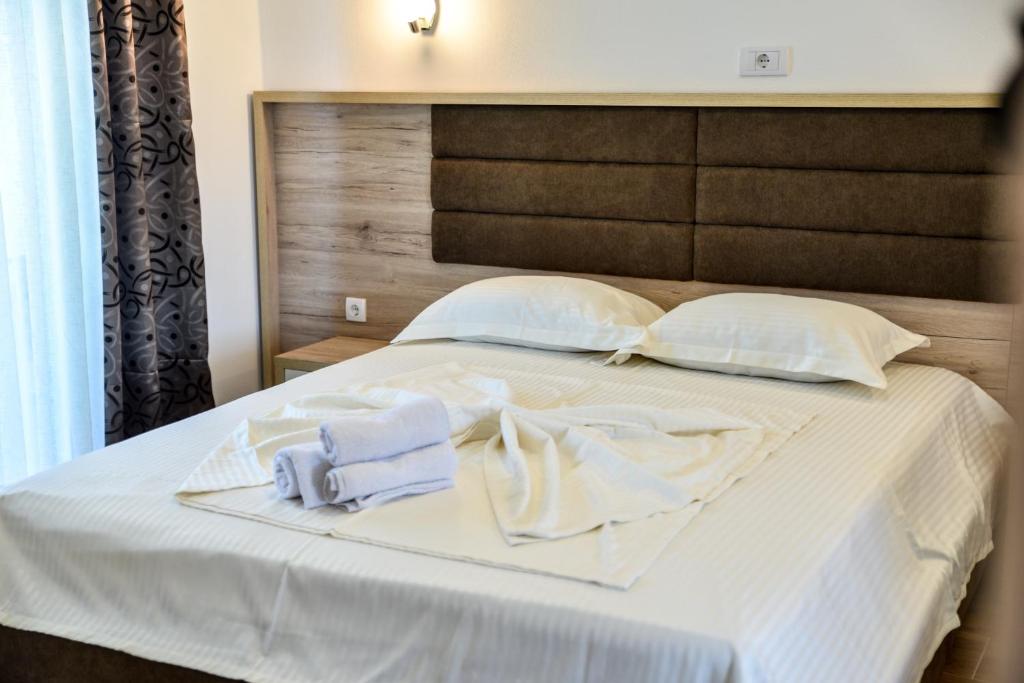 Postel nebo postele na pokoji v ubytování Casa Sinani