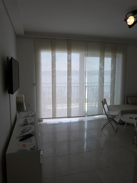 Televízia a/alebo spoločenská miestnosť v ubytovaní Apartment NoStress