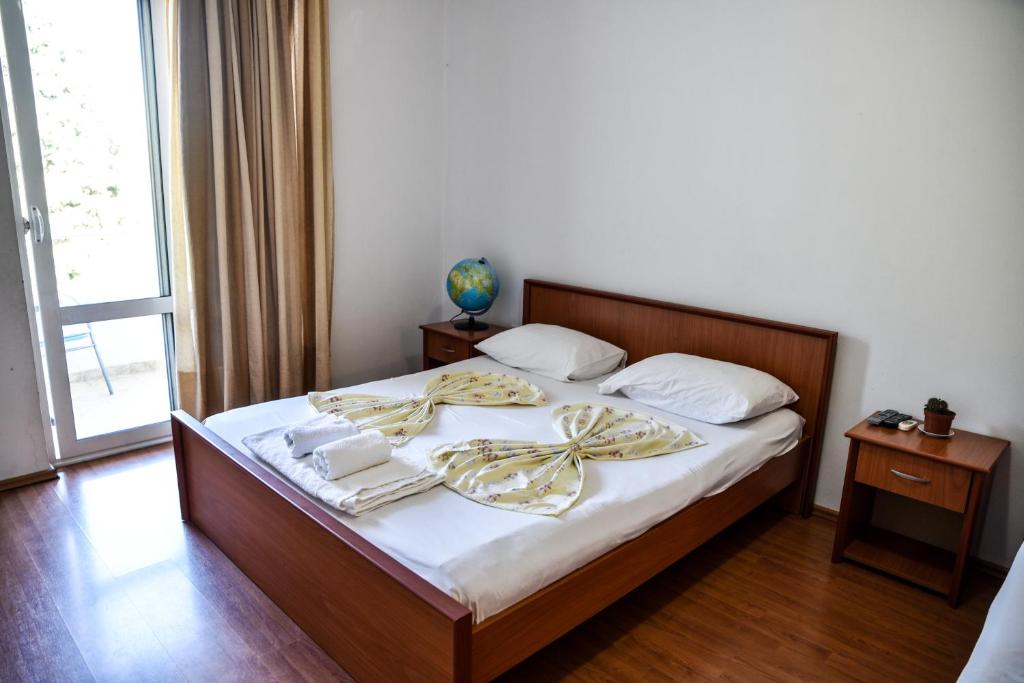 Postel nebo postele na pokoji v ubytování Casa Sinani