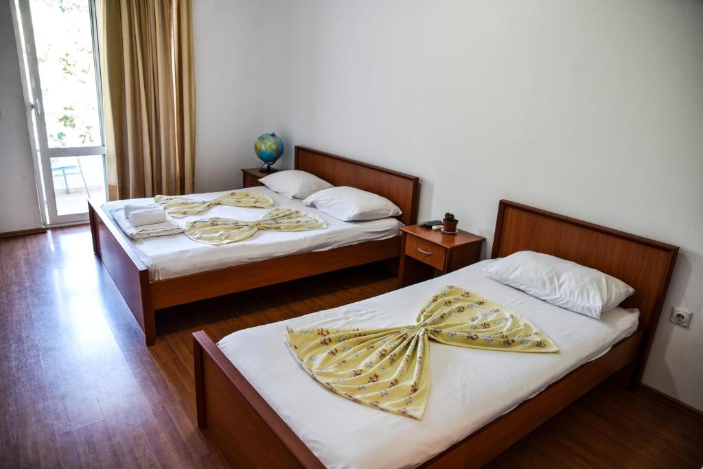 Postel nebo postele na pokoji v ubytování Casa Sinani