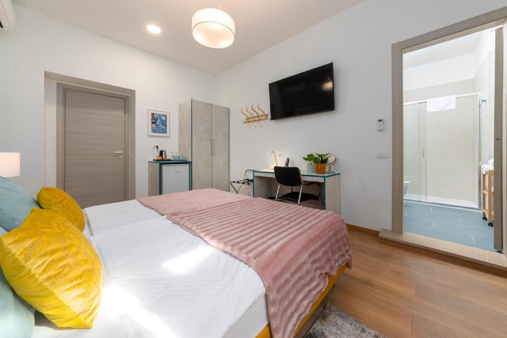 TV a/nebo společenská místnost v ubytování Polesana Rooms