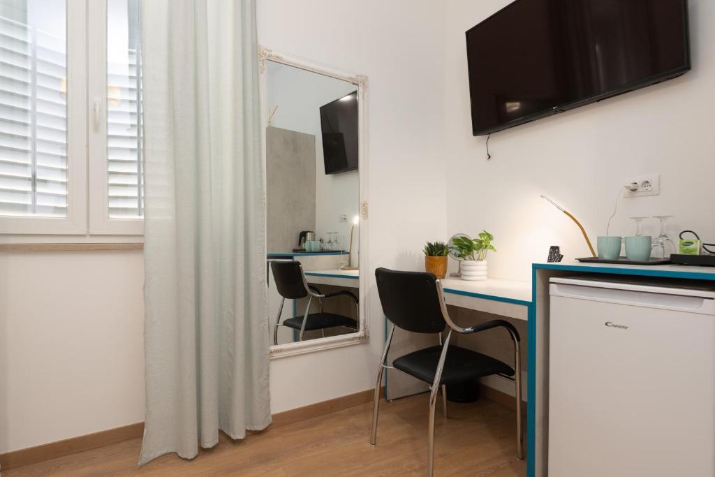 Kuchyň nebo kuchyňský kout v ubytování Polesana Rooms