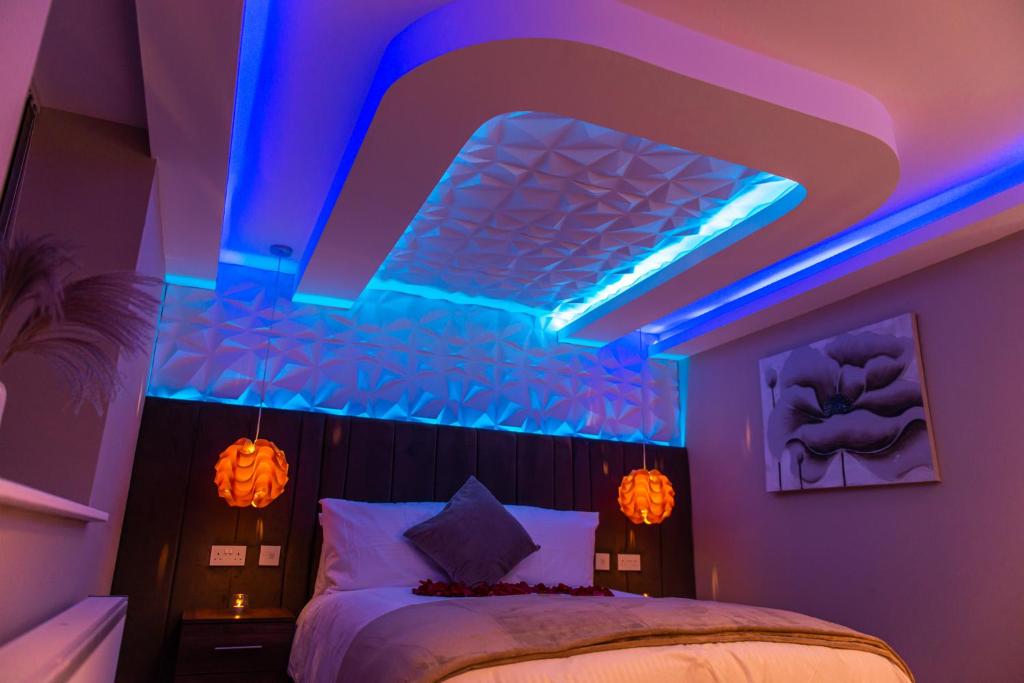 Postel nebo postele na pokoji v ubytování Optimal Apartments