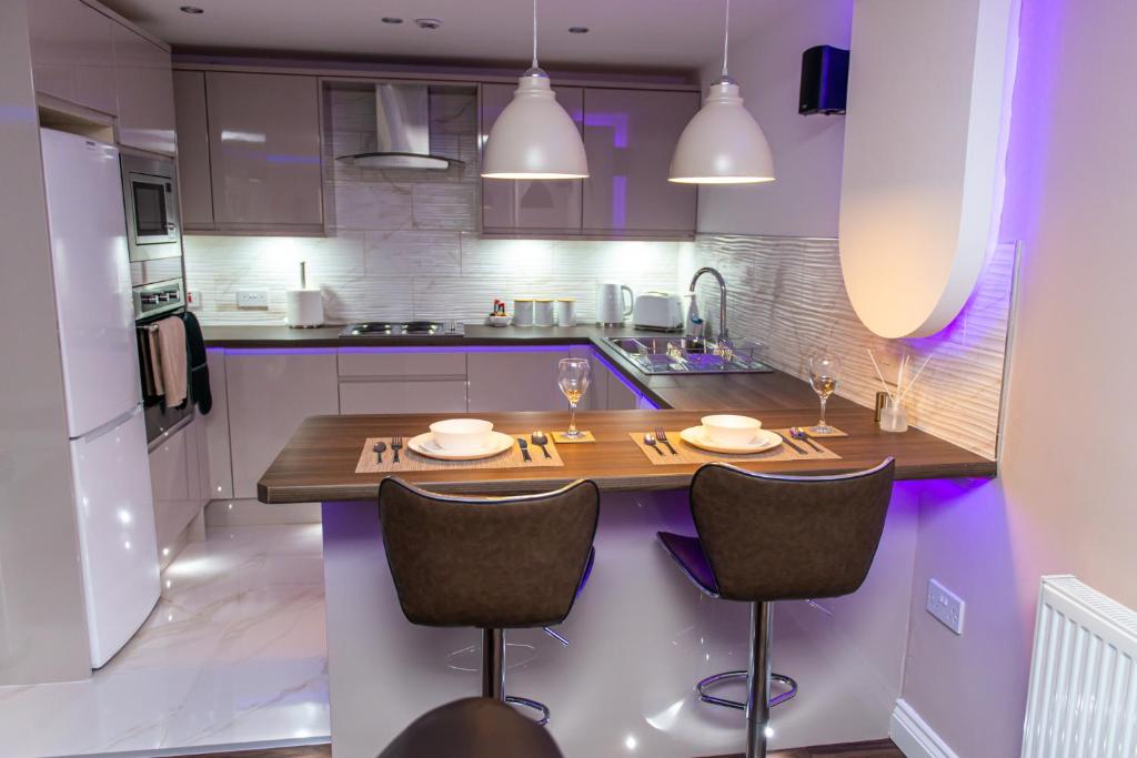 Kuchyň nebo kuchyňský kout v ubytování Optimal Apartments