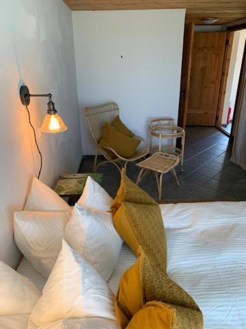Postel nebo postele na pokoji v ubytování Pilguse Residency