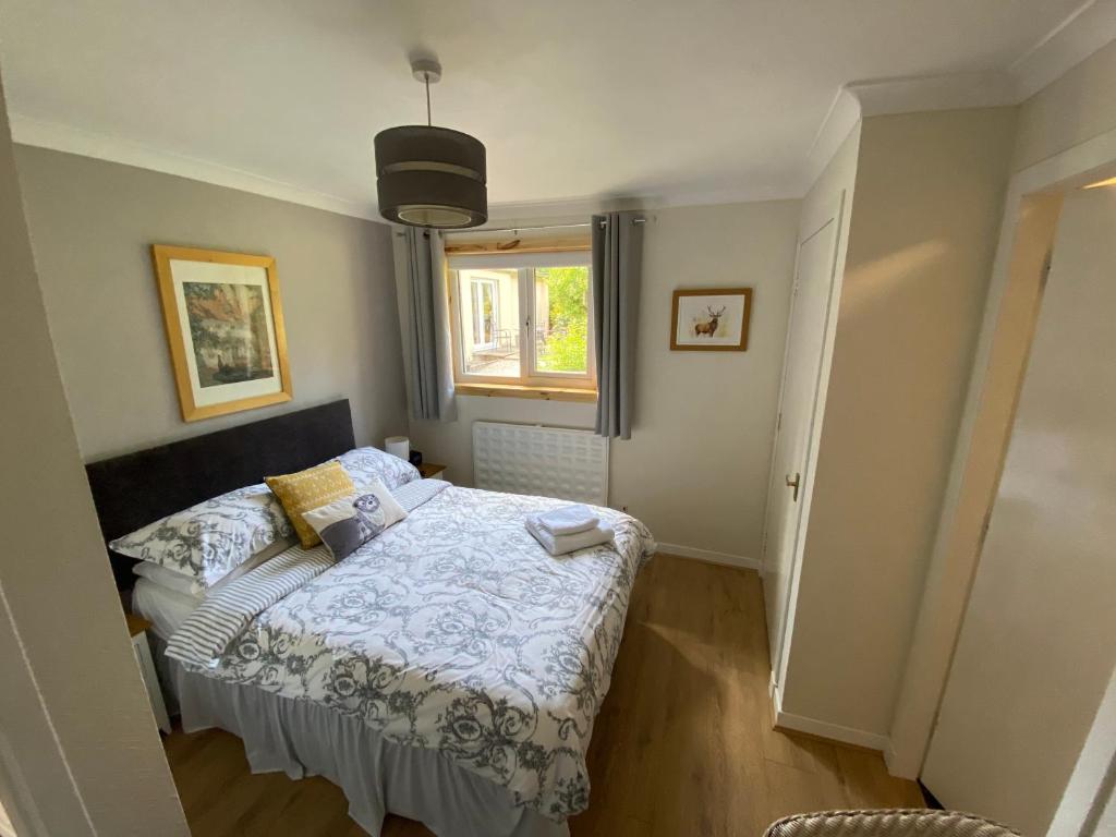 Postel nebo postele na pokoji v ubytování Stables Guest House