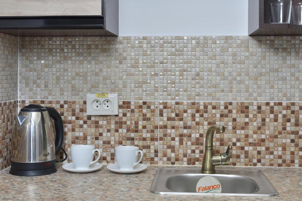 Příslušenství pro přípravu čaje a kávy v ubytování Venus hotel