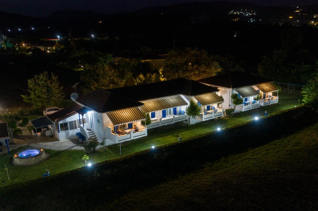 an aerial view of a house at night at Blue Houses Apartments in Finikounta