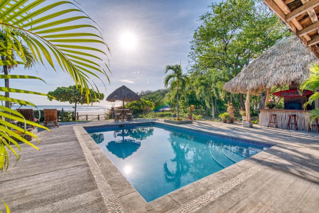 an image of a swimming pool at a resort at La Veranera, Playa El Coco in San Juan del Sur