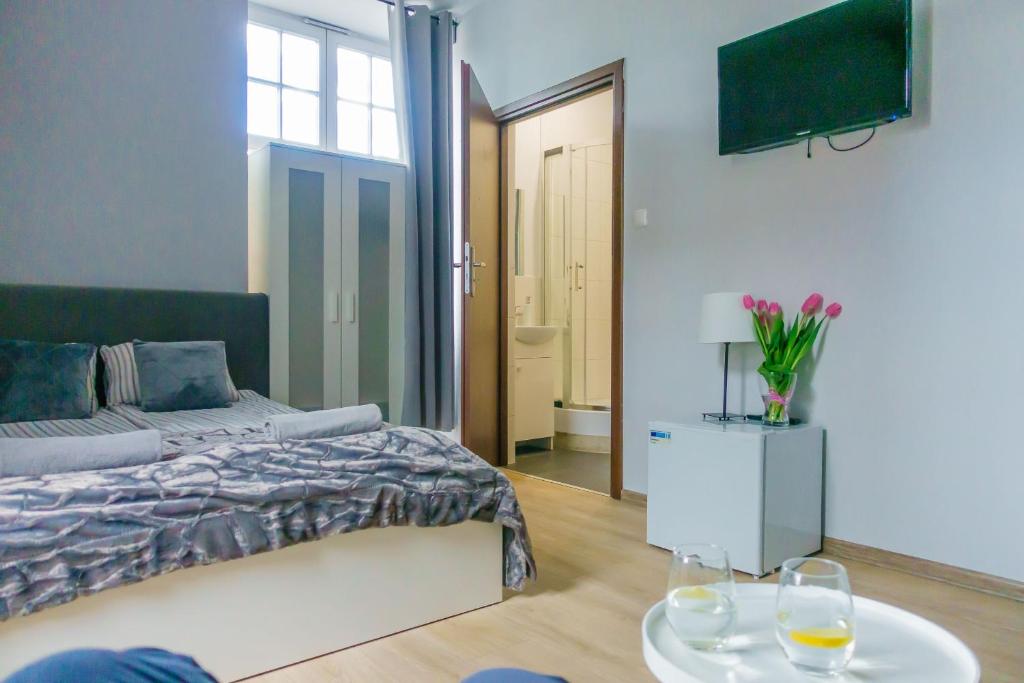 Posteľ alebo postele v izbe v ubytovaní Trip & Hostel