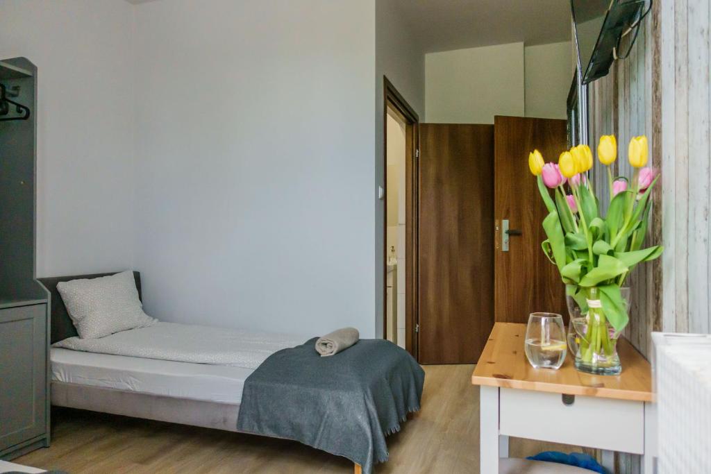 Posteľ alebo postele v izbe v ubytovaní Trip & Hostel