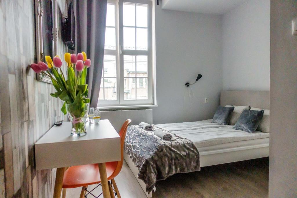 Posteľ alebo postele v izbe v ubytovaní Trip & Hostel