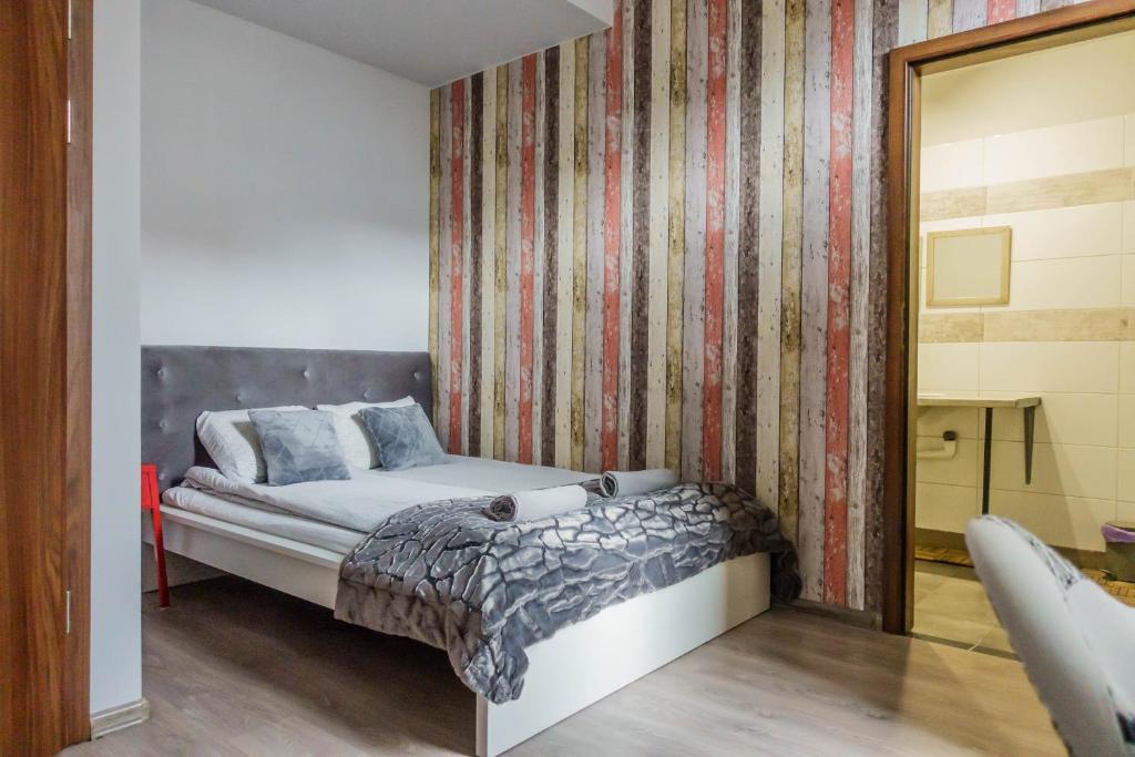 Posteľ alebo postele v izbe v ubytovaní Trip & Hostel