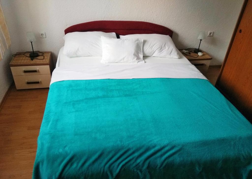 Posteľ alebo postele v izbe v ubytovaní 11 Primorska ulica