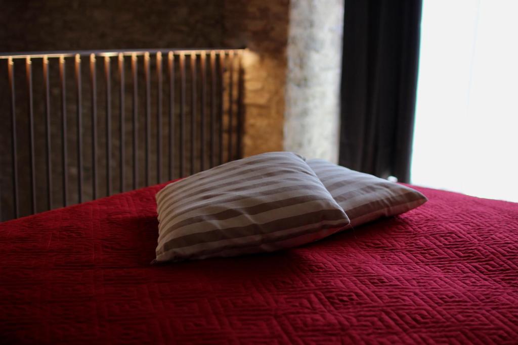 Postel nebo postele na pokoji v ubytování Relais Mevigo - Casa Pietra