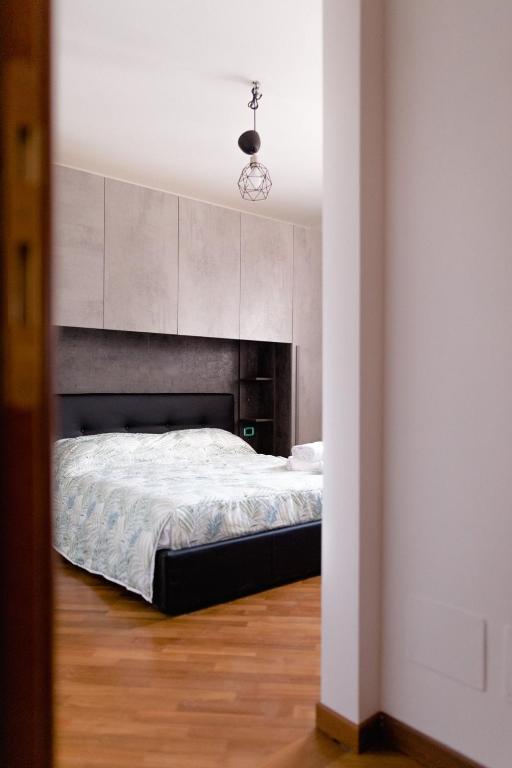 Postel nebo postele na pokoji v ubytování Les Chambres
